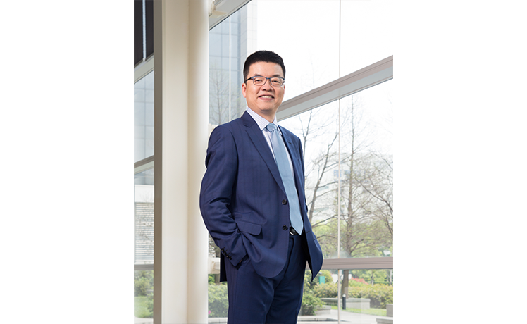 Dr. Jun He